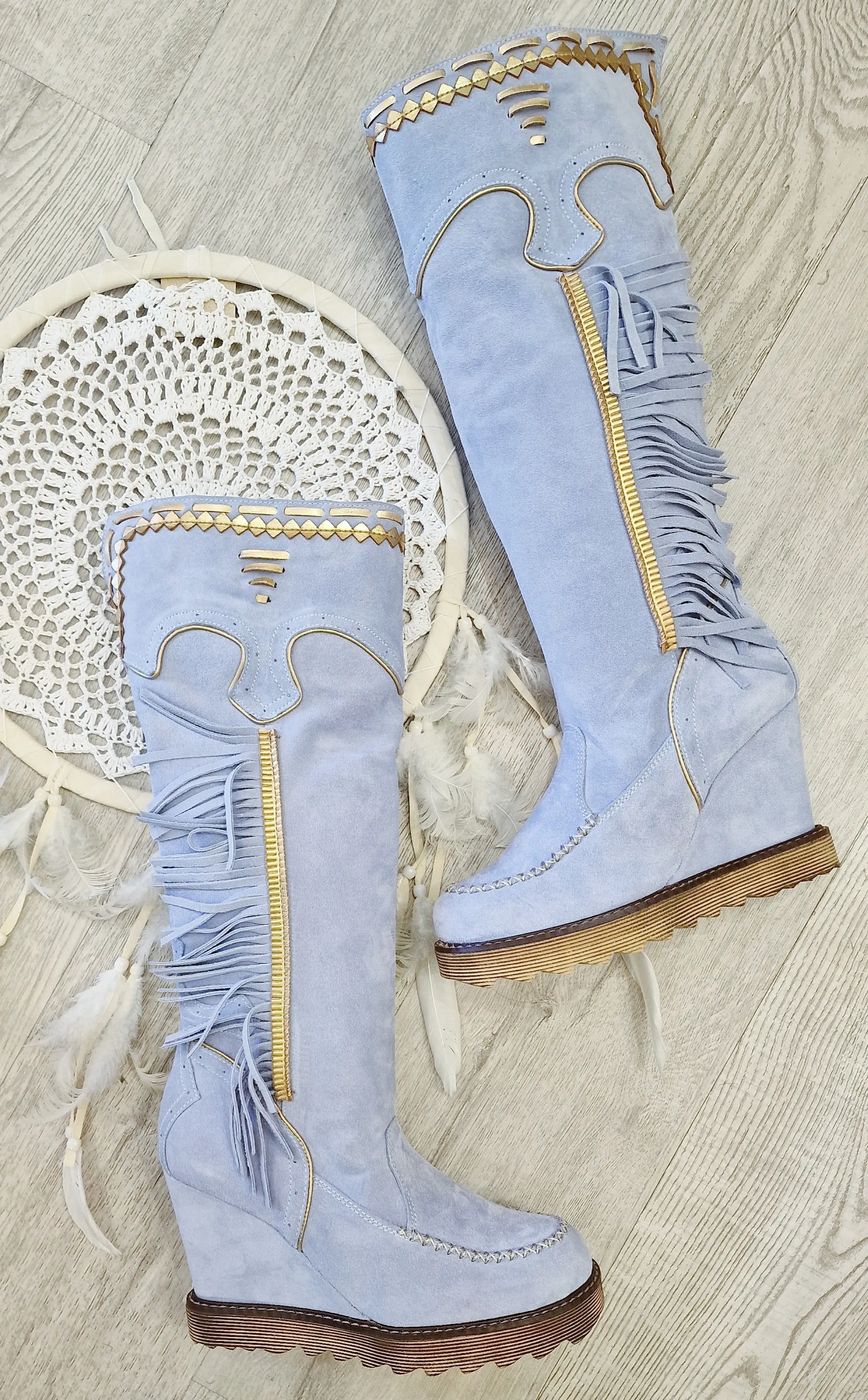 Botas piel flecos celeste