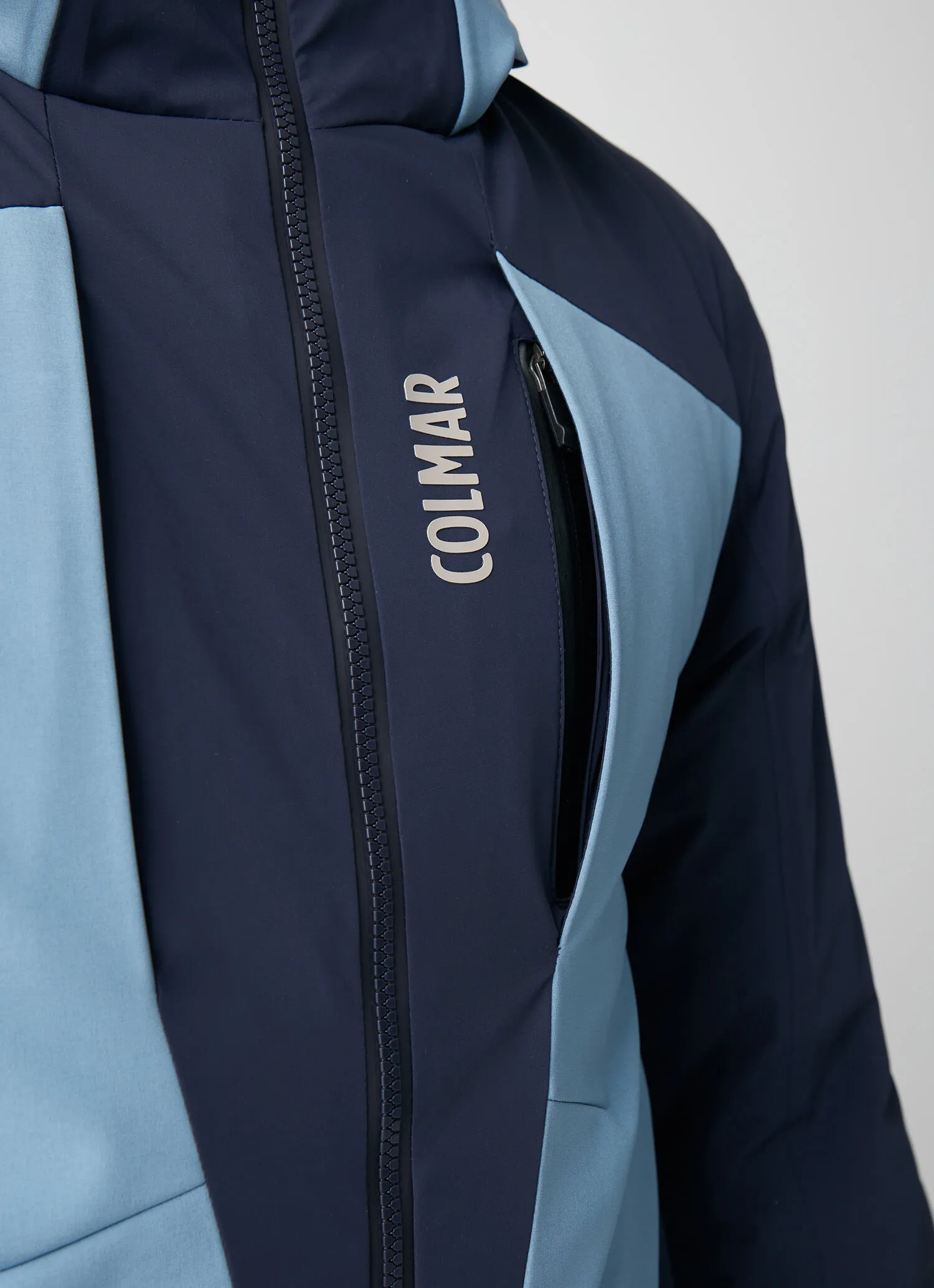 Chaqueta de esquí elástico con bolsillo trasero