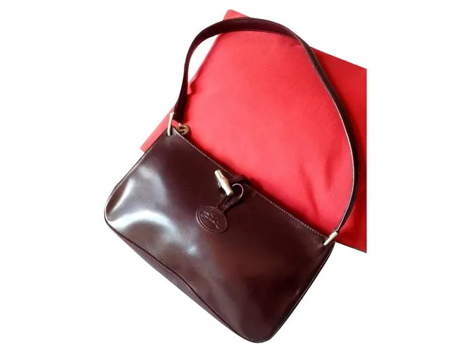 Roseau Longchamp Zona horaria Burdeos 