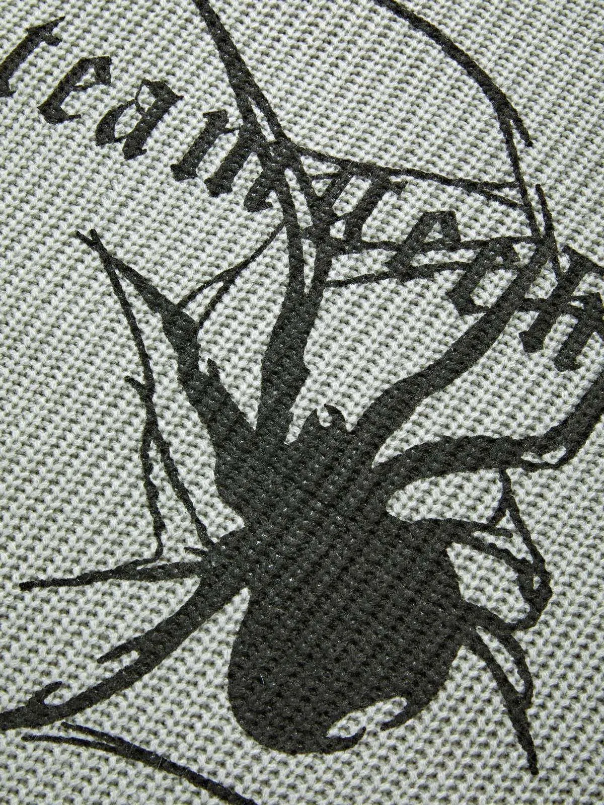 Suéter tipo jersey desgastado con jacquard animal punk