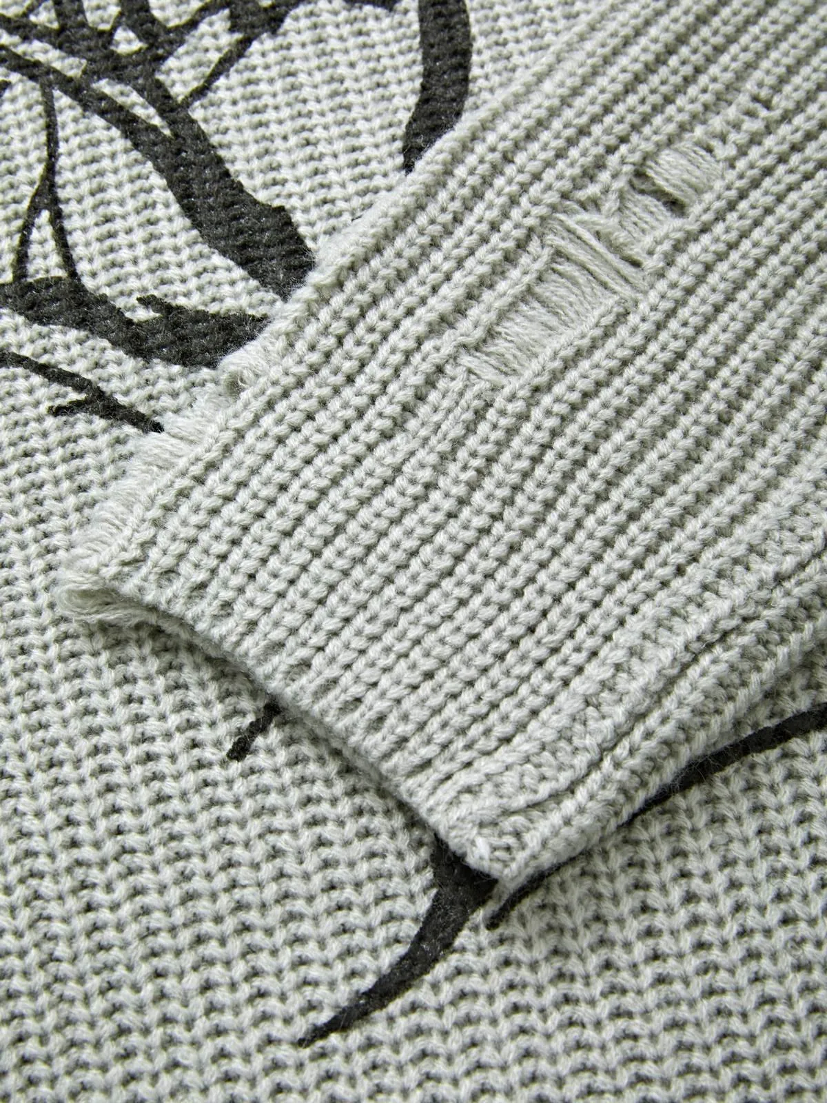 Suéter tipo jersey desgastado con jacquard animal punk
